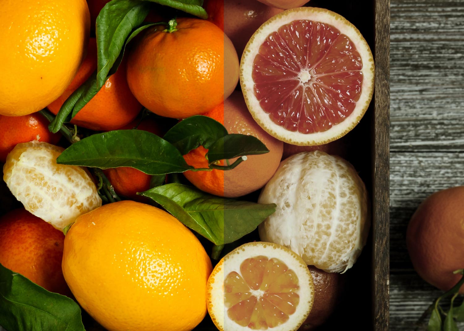 A close-up of various citrus fruits, including oranges, grapefruits, and peeled sections, highlighting their vibrant colors.