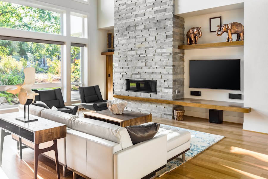 Living room with home AV, including tv and speakers.