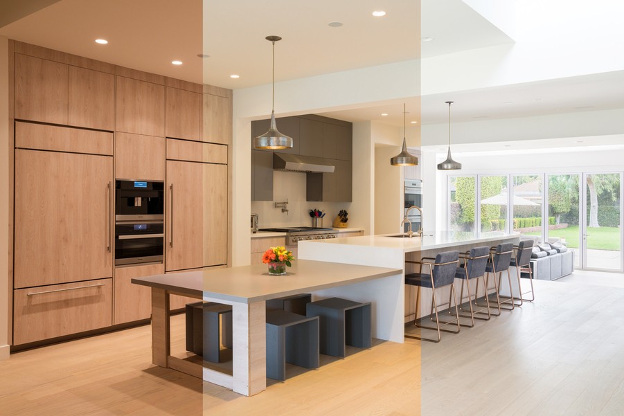 Modern kitchen showcasing lighting automation with a visual split demonstrating different lighting scenes, featuring sleek cabinetry, a central island with stools, and a bright, open view to the backyard.