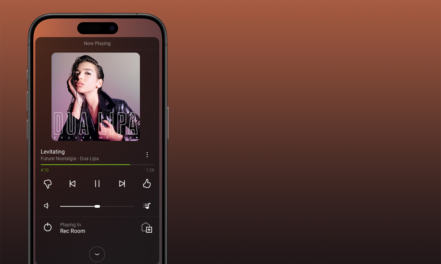 Person holding smartphone displaying smart home controls